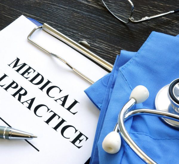 Medical,Malpractice.,Medical,Suit,,Stethoscope,And,Documents.